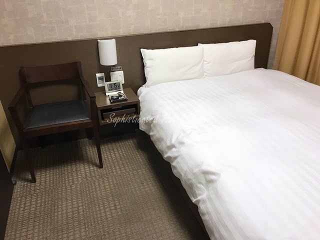 ドーミーインプレミアム京都駅前の客室ベッド